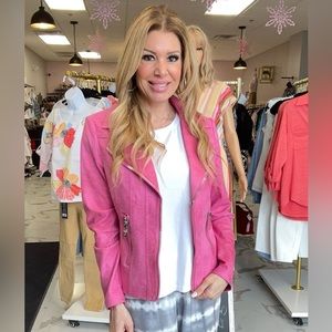 Faux suede. Fits snug. New jacket with tags.